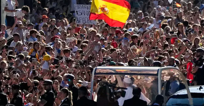 Pope Leo XIV arrives to preside over Mass on the occasion of the Catholic feast of Corpus Christi in Plaza de Cibeles in Madrid, Sunday, June 7, 2026, on the second day of a seven-day apostolic journey to mainland Spain and the Canary Islands. (AP Photo/Alessandra Tarantino) APN