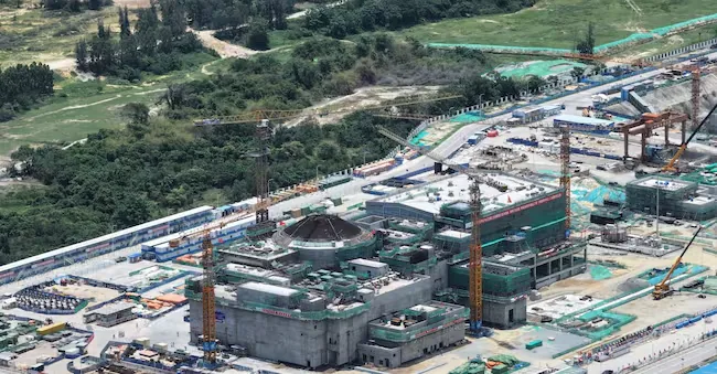 Aerial shot of the construction of the Linglong-1 (ACP-100) site, the world's first commercial on-shore small modular reactor under construction in China Wang Jian/VCG via Reuters Connec
