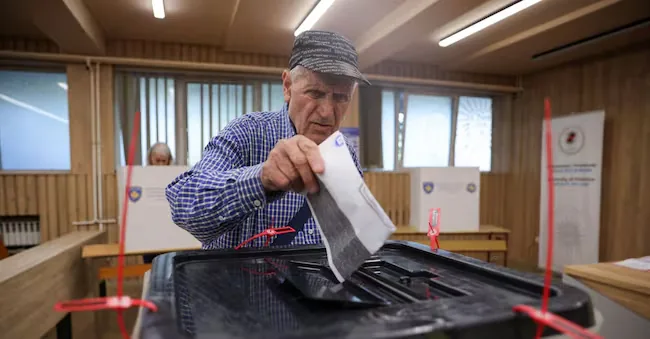 A man votes during early parliamentary elections in Pristina, Kosovo, on June 7, 2026. REUTERS/Valdrin Xhemaj REUTERS
