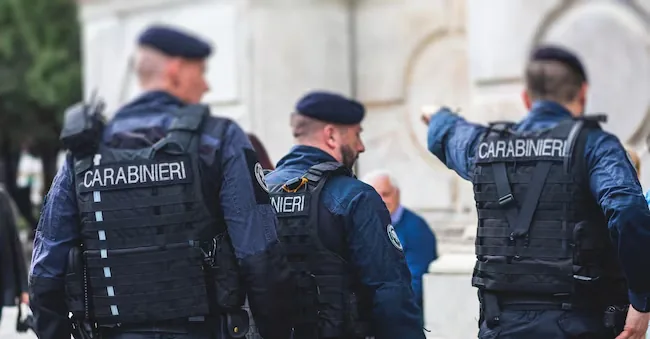 Italian Carabinieri, national gendarmerie of Italy squad,  of Italy patrol formation back view with 