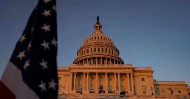 Sunlight illuminates the United States Capitol at sunset, after the vote on the “Sunshine Protection Act,” which would make daylight saving time permanent and allow states with areas exempt from daylight saving time to choose standard time for those areas, in Washington, D.C., United States, July 13, 2026. REUTERS/Al Drago REUTERS