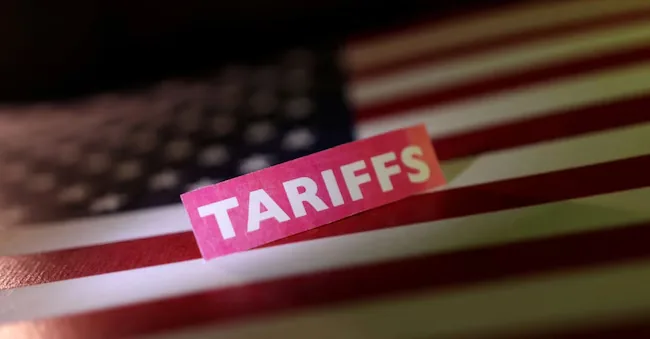 FILE PHOTO: A U.S. flag and a 