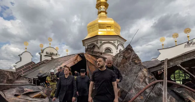 ARCHIVE PHOTO: Ukrainian President Volodymyr Zelenskiy and Ukrainian Prime Minister Yulia Svyrydenko visit the Dormition Cathedral of the Pechersk Lavra in Kyiv, hit during Russian missile and drone attacks in the context of the Russian offensive against Ukraine, in Kyiv, Ukraine, June 15, 2026. Ukrainian Presidential Press Service/Photo provided via REUTERS A via REUTERS
