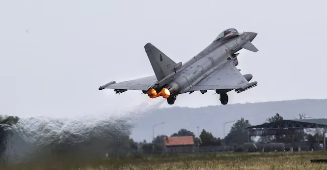 An Italian Eurofighter Typhoon interceptor fighter jet during takeoff. ANSA
