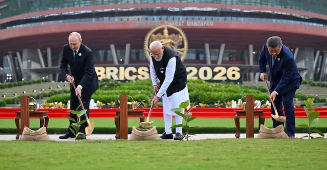 Russian President Vladimir Putin, Indian Prime Minister Narendra Modi, and Chinese President Xi Jinping participate in a joint planting ceremony during the BRICS summit in New Delhi, India, on September 12, 2026. Indian Press Office/Photo provided via REUTERS through REUTERS