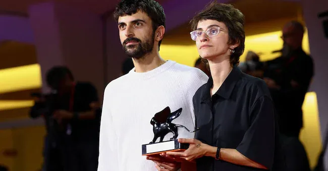 Directors Yuval Abraham and Rachel Szor pose with the Special Jury Prize awarded to “Naza” during the closing ceremony of the 83rd Venice International Film Festival, in Italy, on September 12, 2026. REUTERS/Yves Herman REUTERS